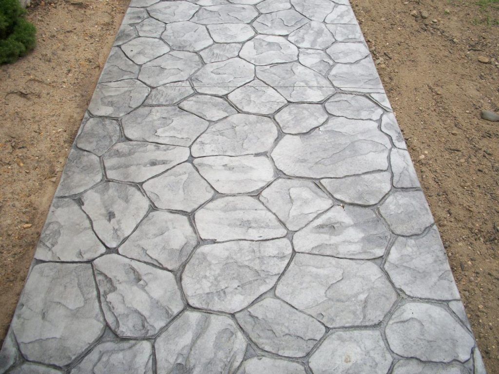 suelo gris exterior de hormigon con dibujo